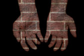 picutre of hands that are brick and wood
